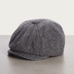 Casquette gavroche tweed herringbone noir blanc fond blanc studio