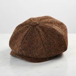 Casquette gavroche laine mouchetée marron roux fond blanc studio
