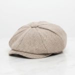 Casquette gavroche tweed herringbone beige fond blanc studio