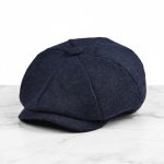 Casquette gavroche tweed herringbone bleu marine fond blanc studio