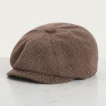 Casquette gavroche tweed herringbone marron caramel fond blanc studio